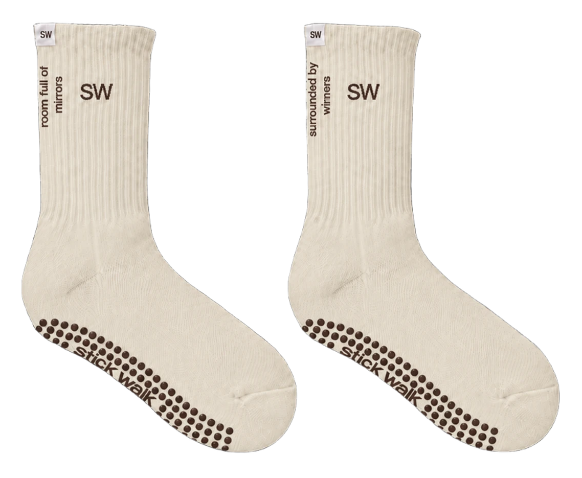 Stick Walk grip crew sock in cream — SW cuff mark, side slogans, espresso silicone grip sole