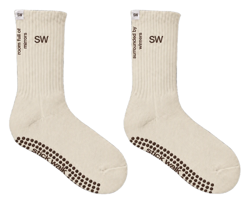 Stick Walk grip crew sock in cream — SW cuff mark, side slogans, espresso silicone grip sole